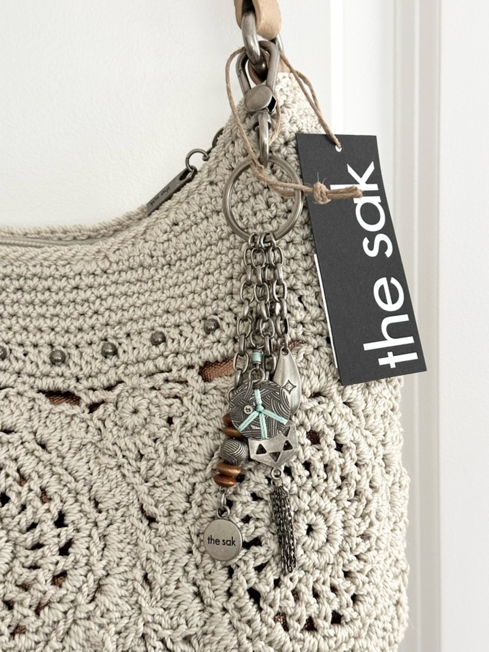 The Sak Sequoia Cream & Tan Crochet Leather Hobo Shoulder Bag with Bag Charm - Picture 10 of 17